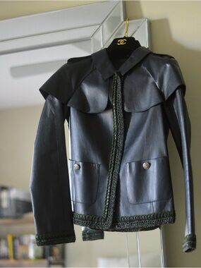 Chanel 2012 spring navy leather jacket 
Size 34